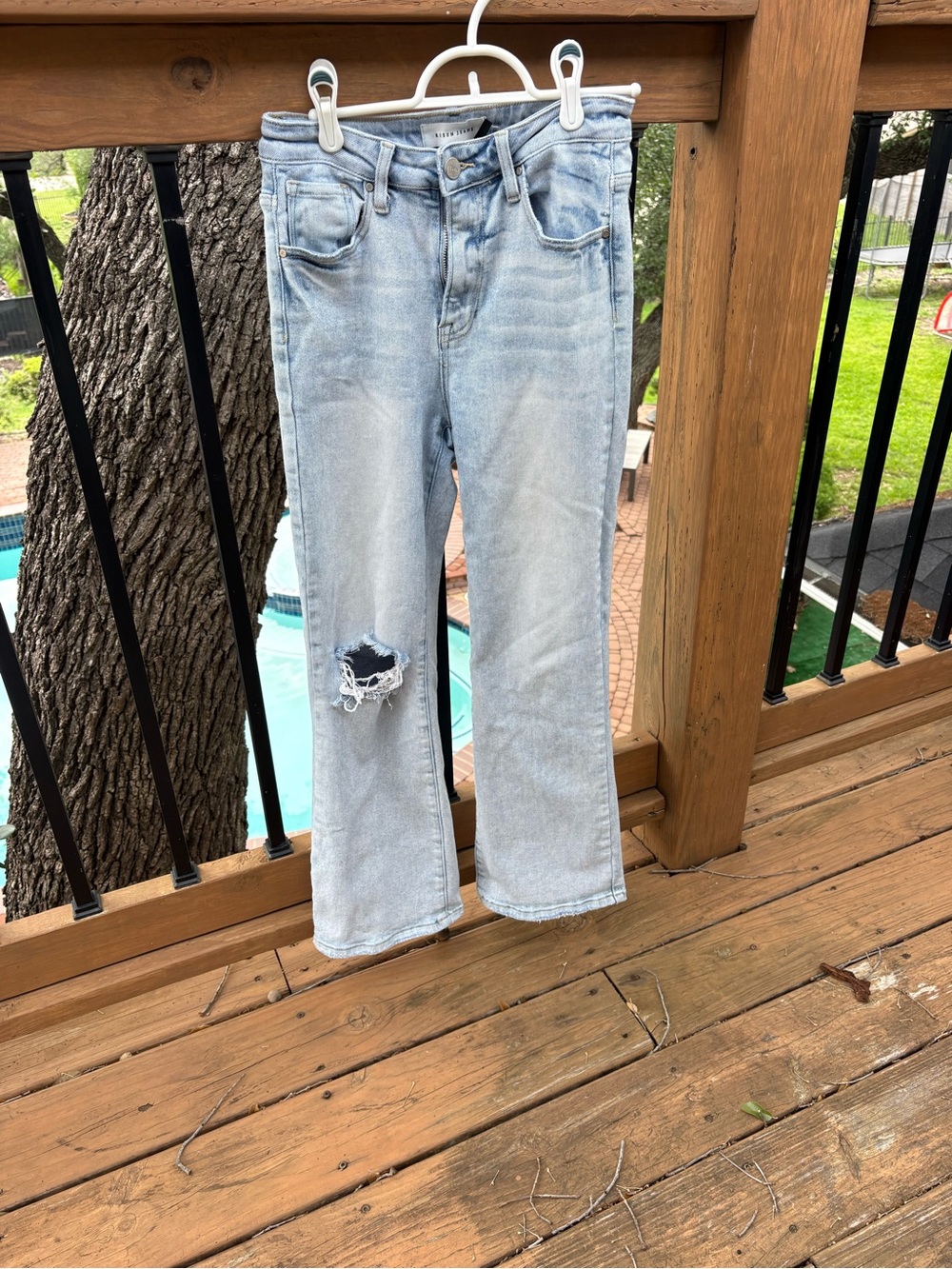 Light Blue Distressed Boot Cut Jeans - Women's